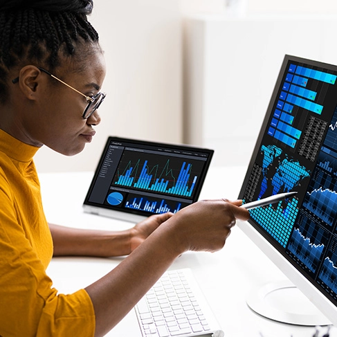 person analyzing data on a screen